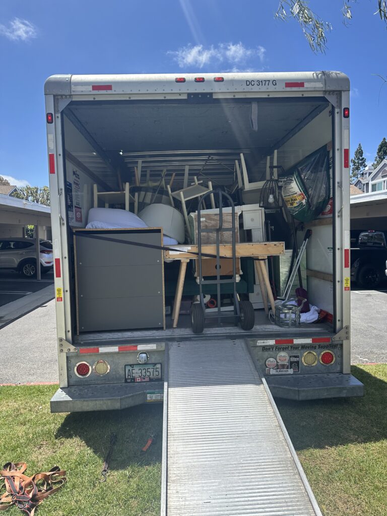 Household items loaded into a moving truck.