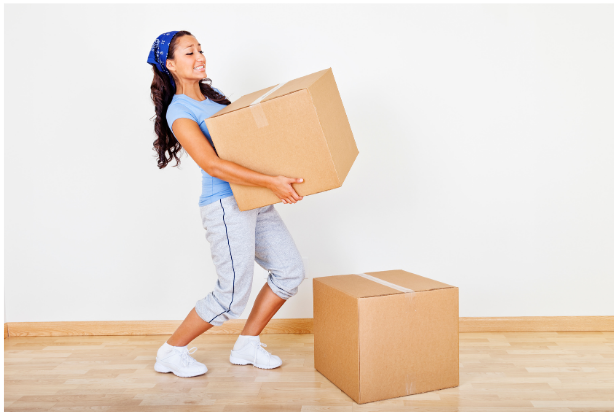 lady lifting a large box