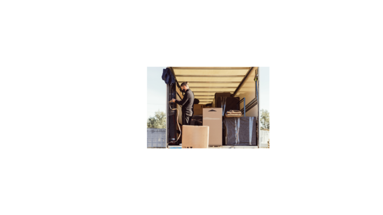 a man packing a moving truck