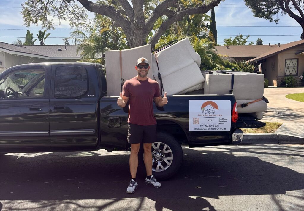 full size couch strapped into pickup truck bed and delivered in Orange County.