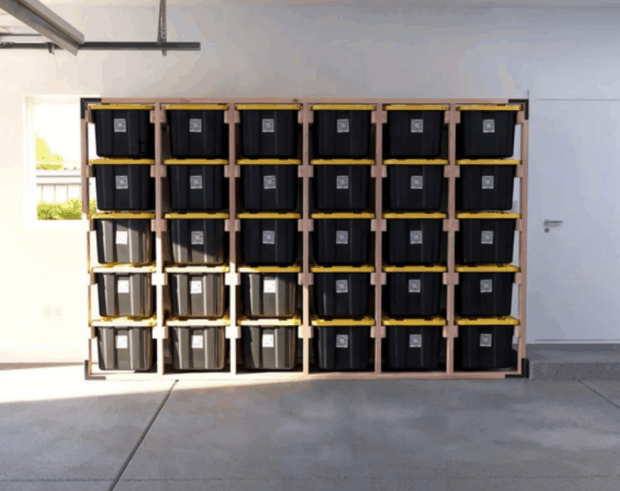 Garage with zones and labeled bins on shelves.